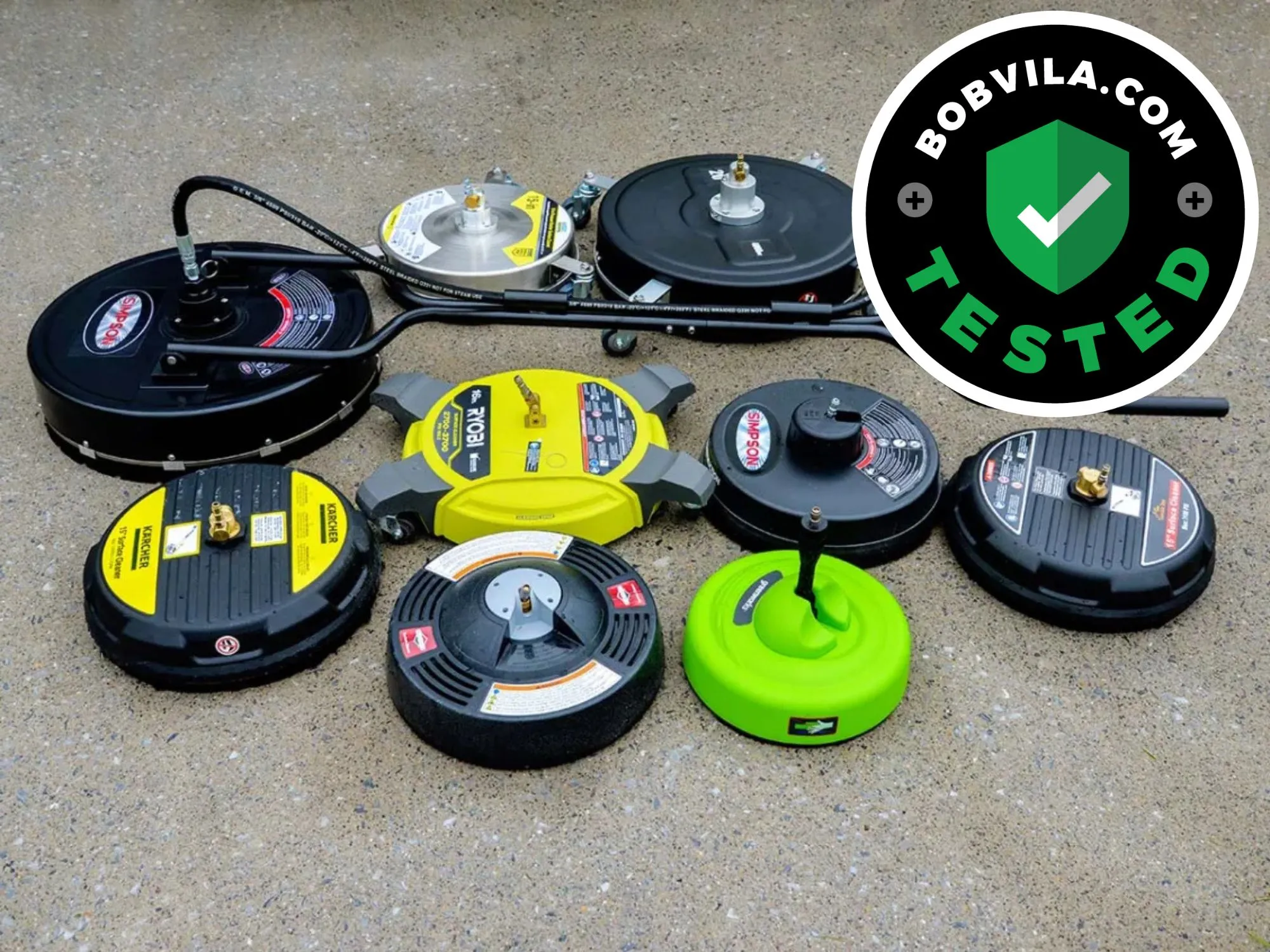 A group of the best pressure washer surface cleaners on a driveway before testing